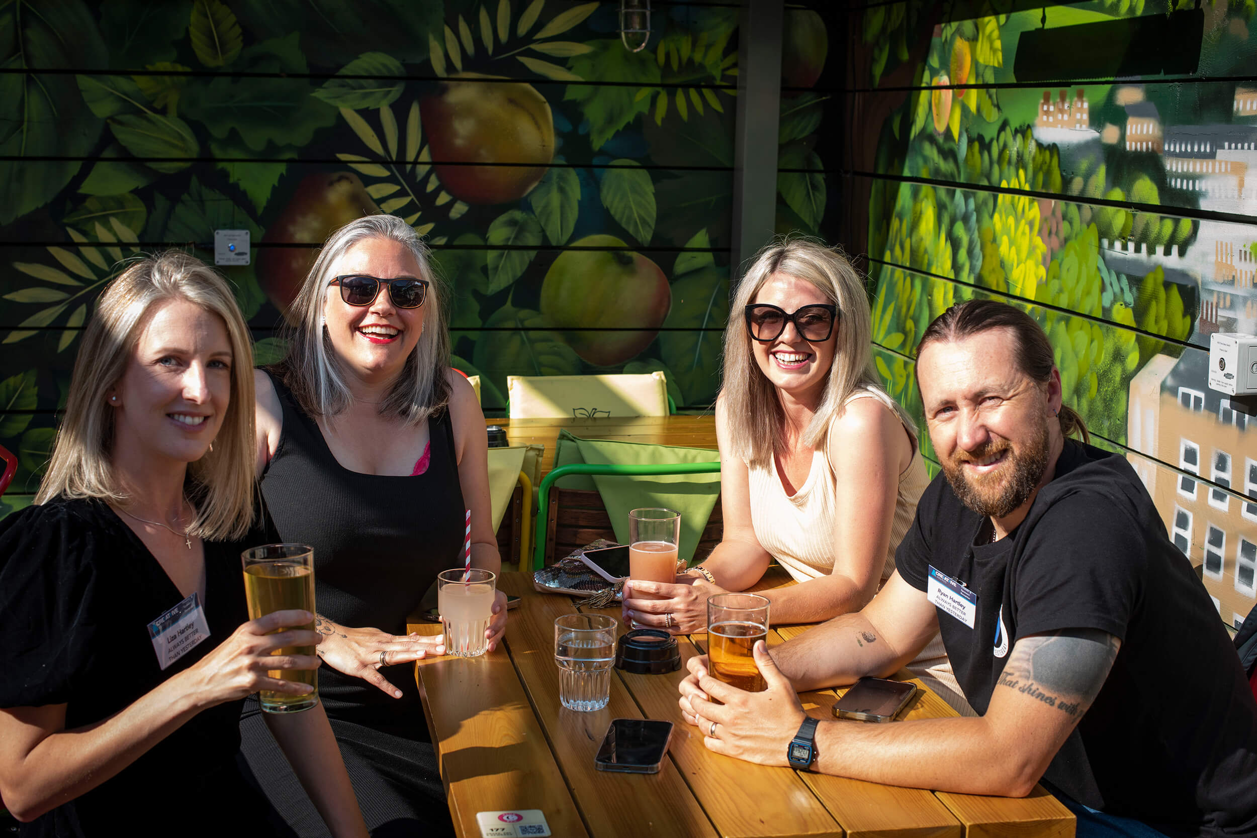 Group of people around a table at the Creative bath reception
