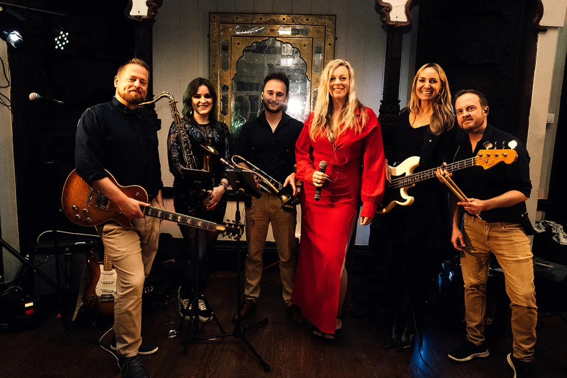 6_piece_band_with_horns_lighter.jpg